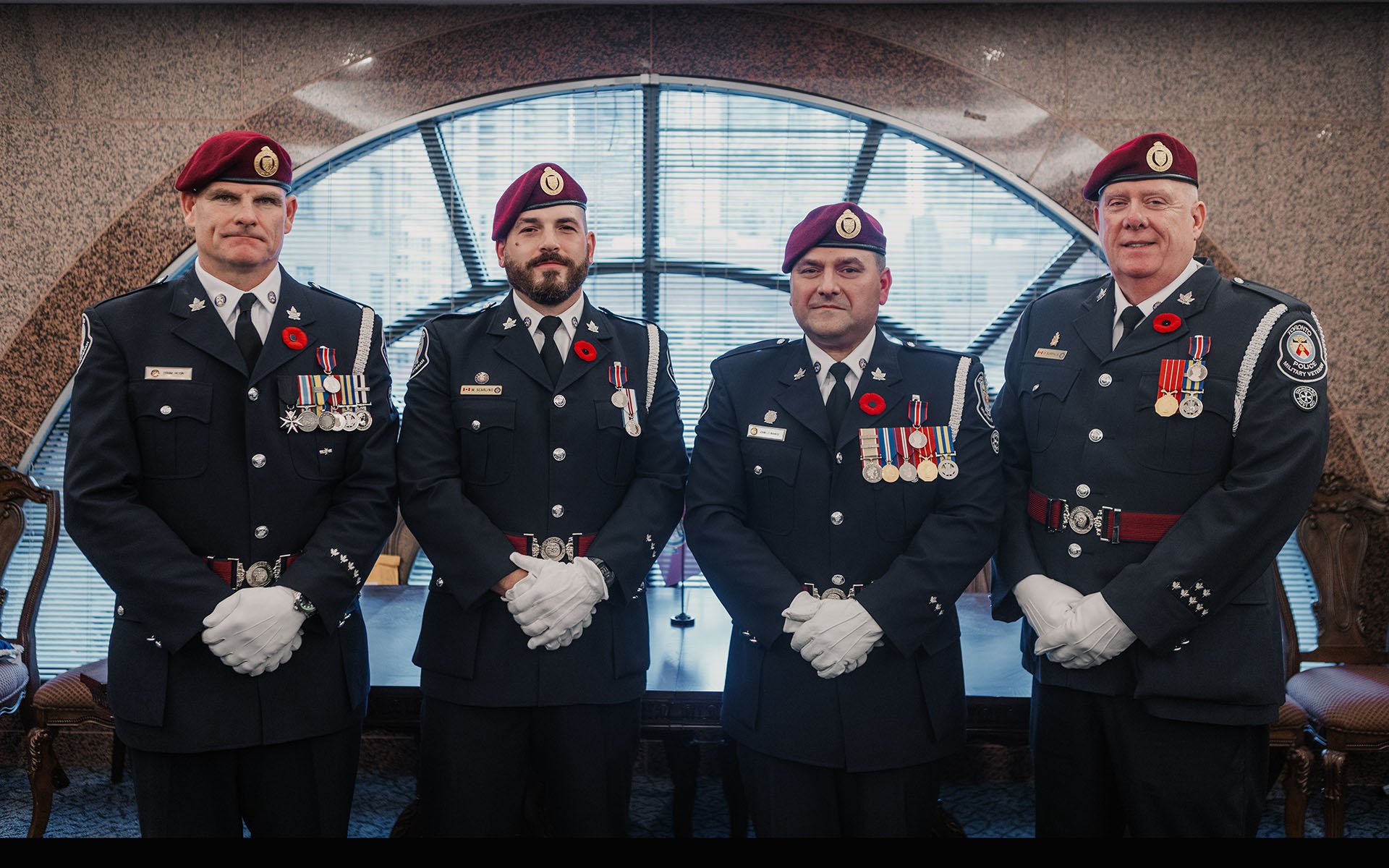 Four police officers standing