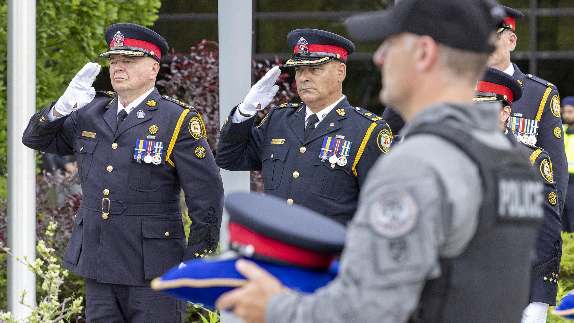 Police officers saluting