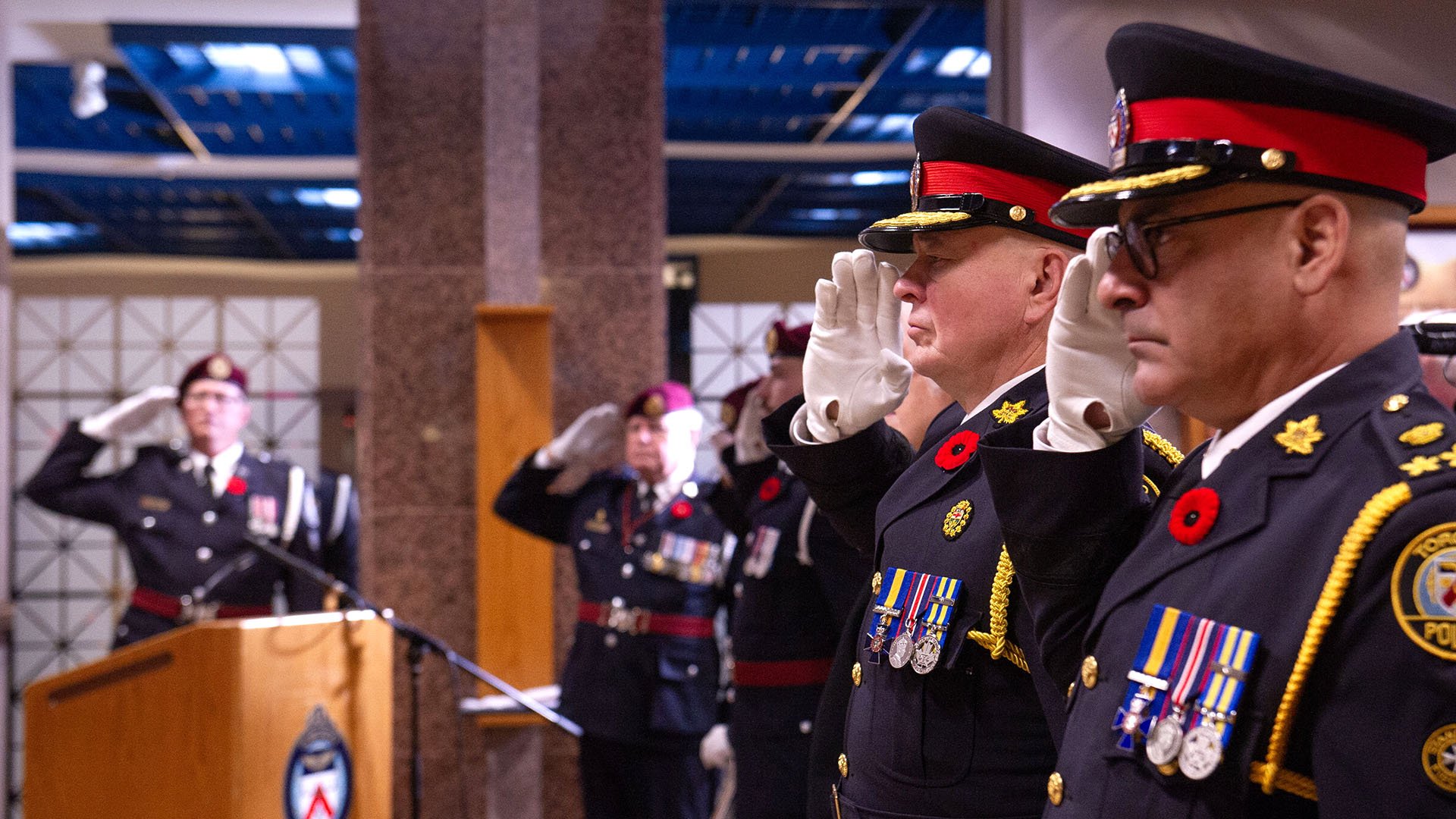 Police officers saluting