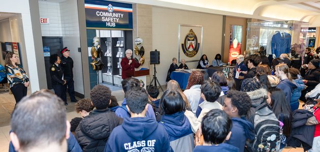 Group of people listening to a speaker