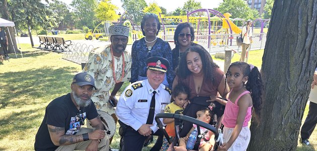 Group of people with a police officer