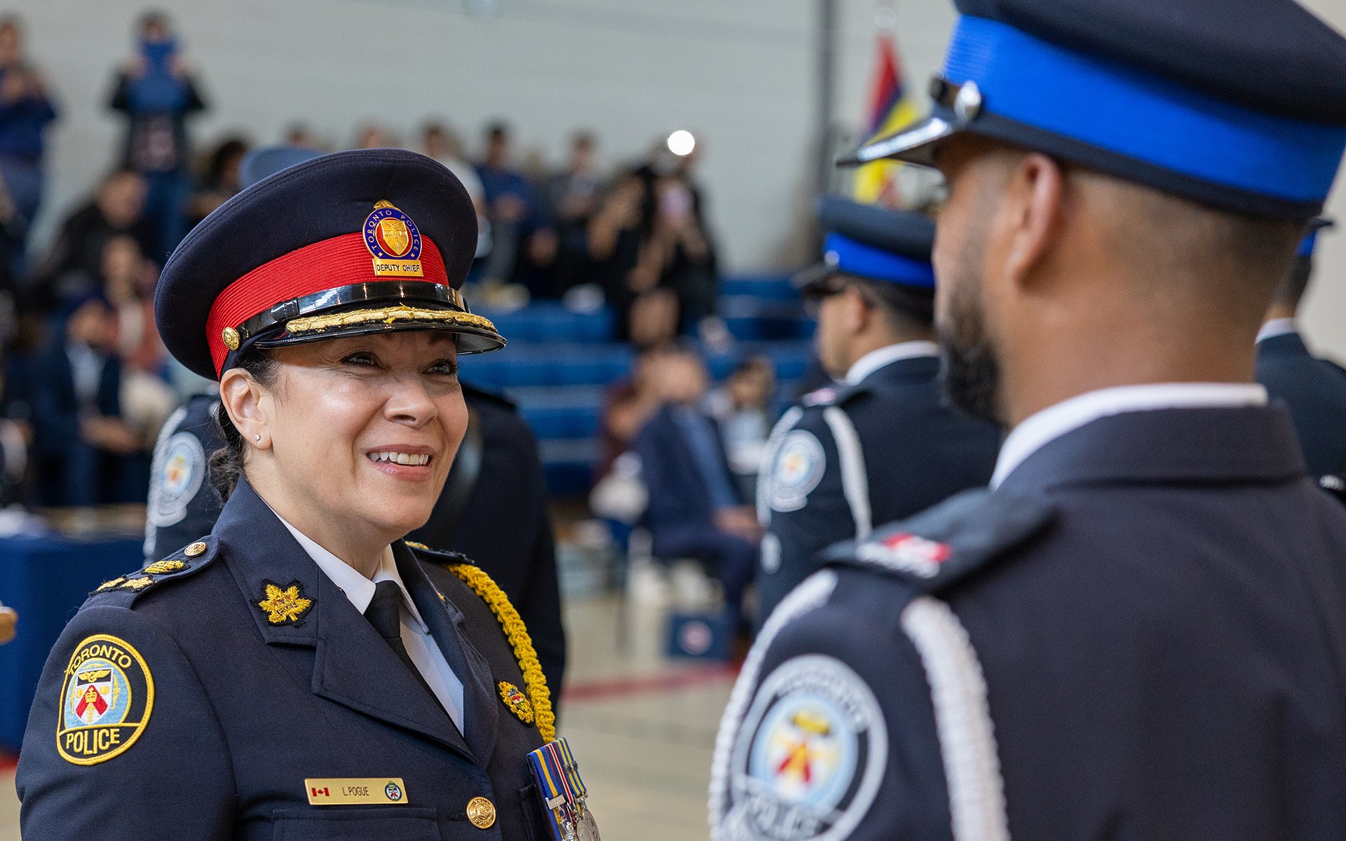 Police officer talks to special constbale