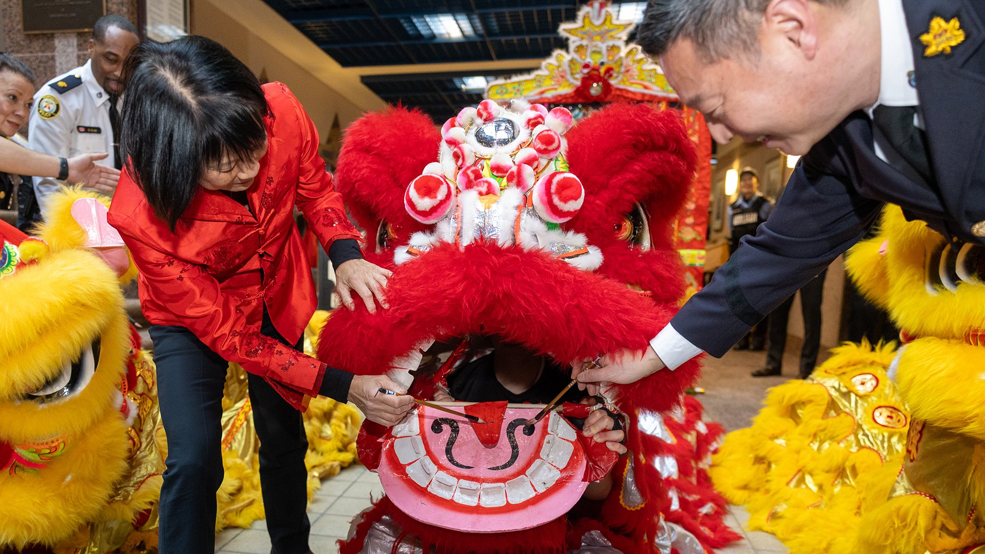 Two people with lion costume