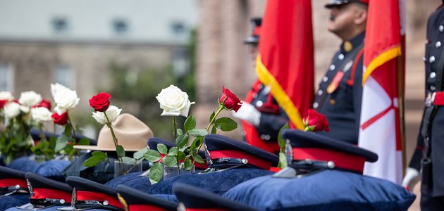 Roses beside police hats