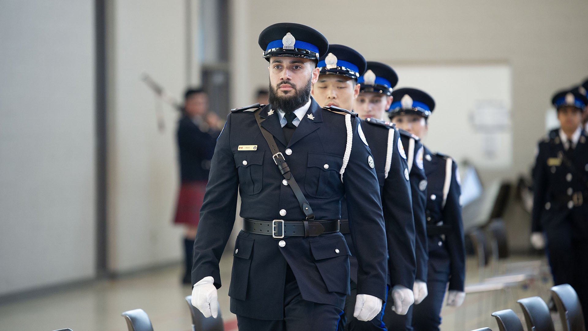 A line of parking officers.