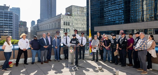 Group of people with person at podium