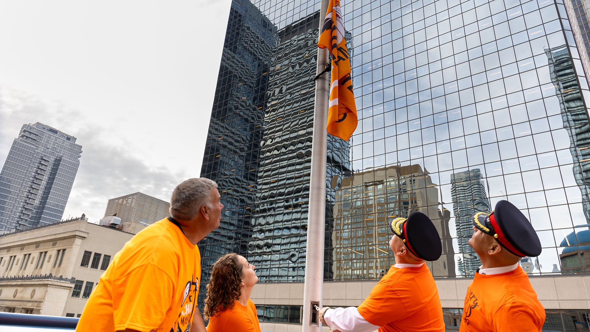 People raising a flag