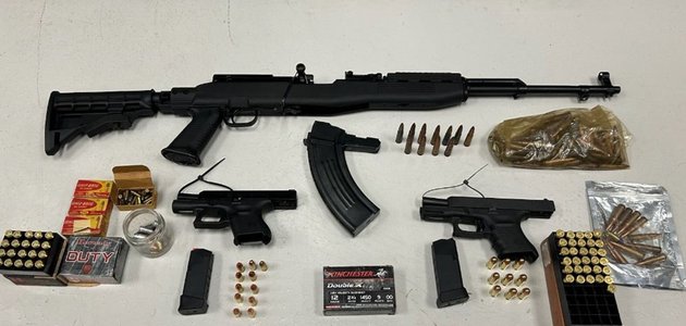 Guns and ammunition on a table