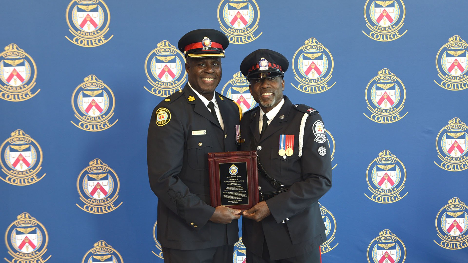 Two people in TPS uniform