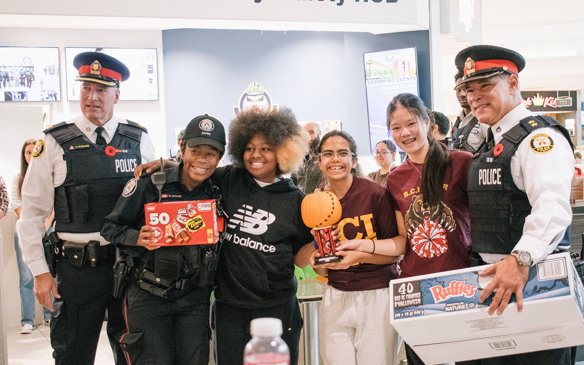 Police officers and young people.