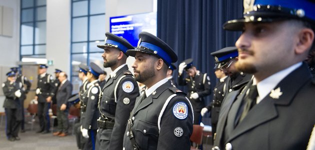A group of parking officers standing