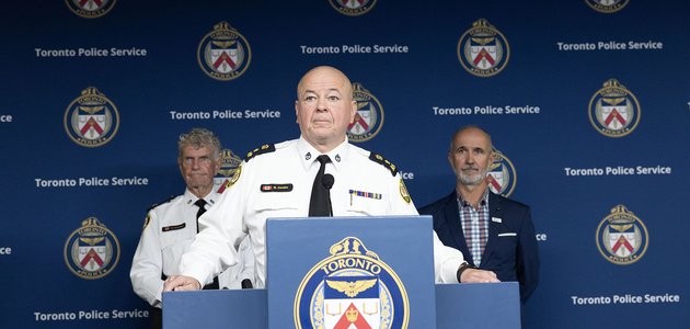 Police officer at a podium