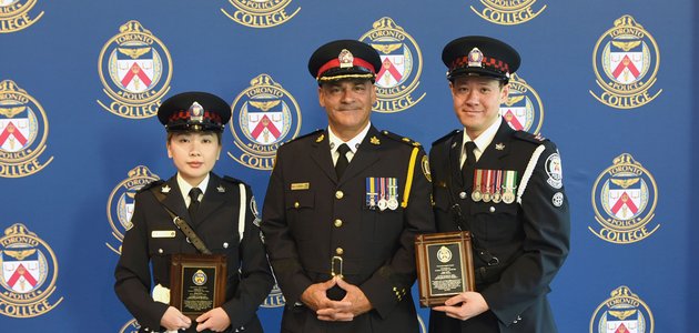 Three people in TPS uniform