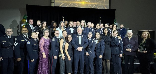 Group of people standing on a stage