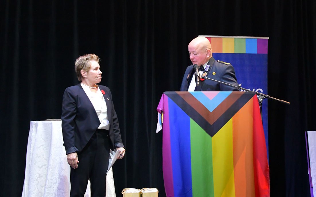 Two people at a podium