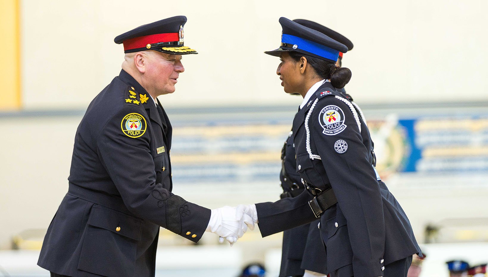 Police officer shaking hands with Special Constable