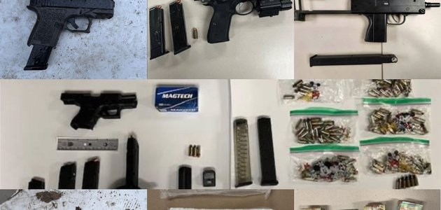 Handguns, magazines, ammunition on tables