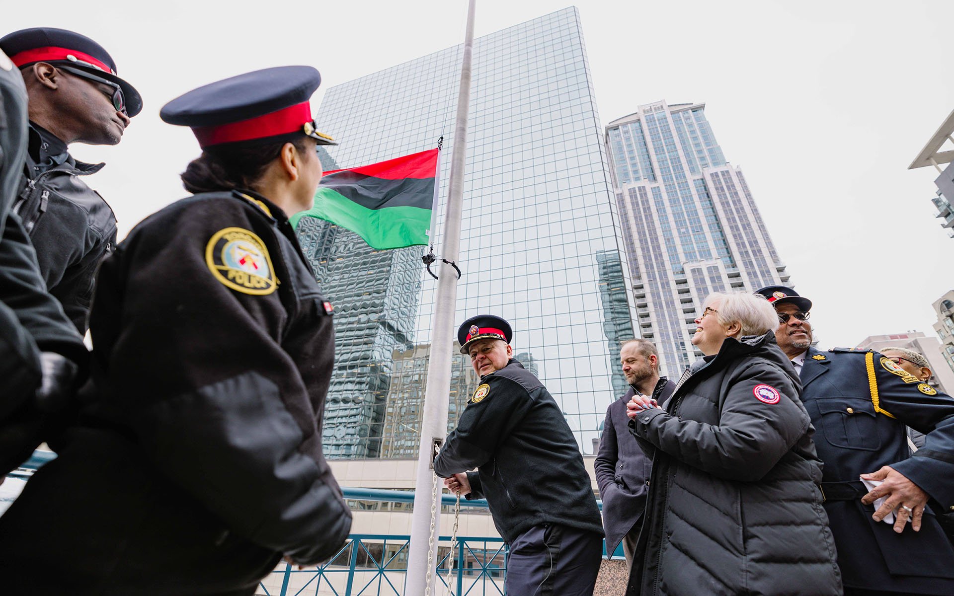 Police officer raising flag