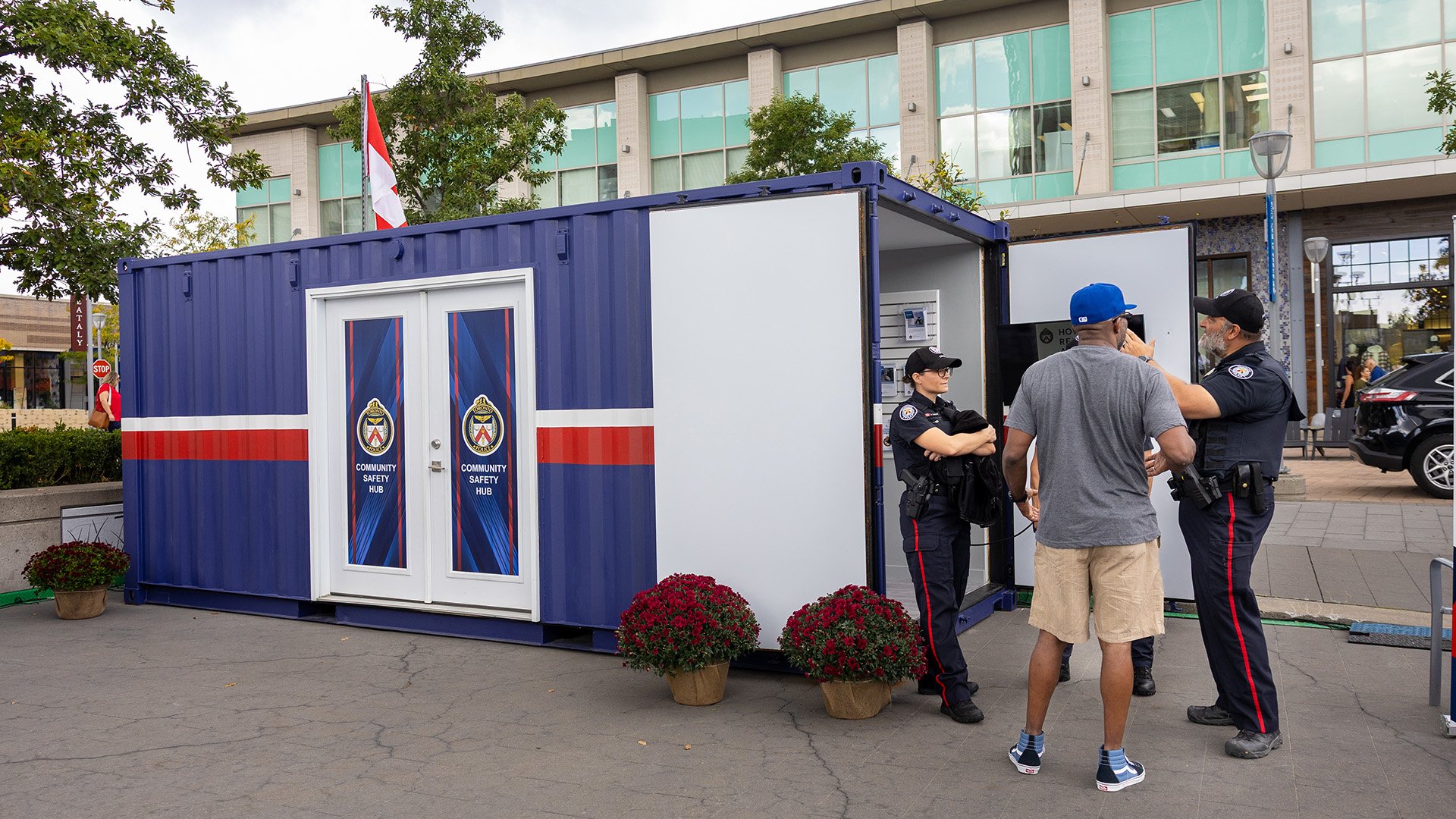 Storage container with police officers talking