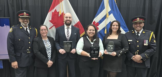 Superintendent Greg Watts, Manager Monica Di Toll, Communications Operators Brendan Manna, Marina Makary and Kaitlin Hain and Chief Superintendent Mandeep Mann