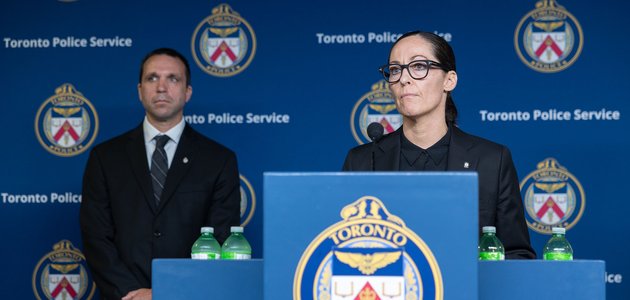 Two people at a podium
