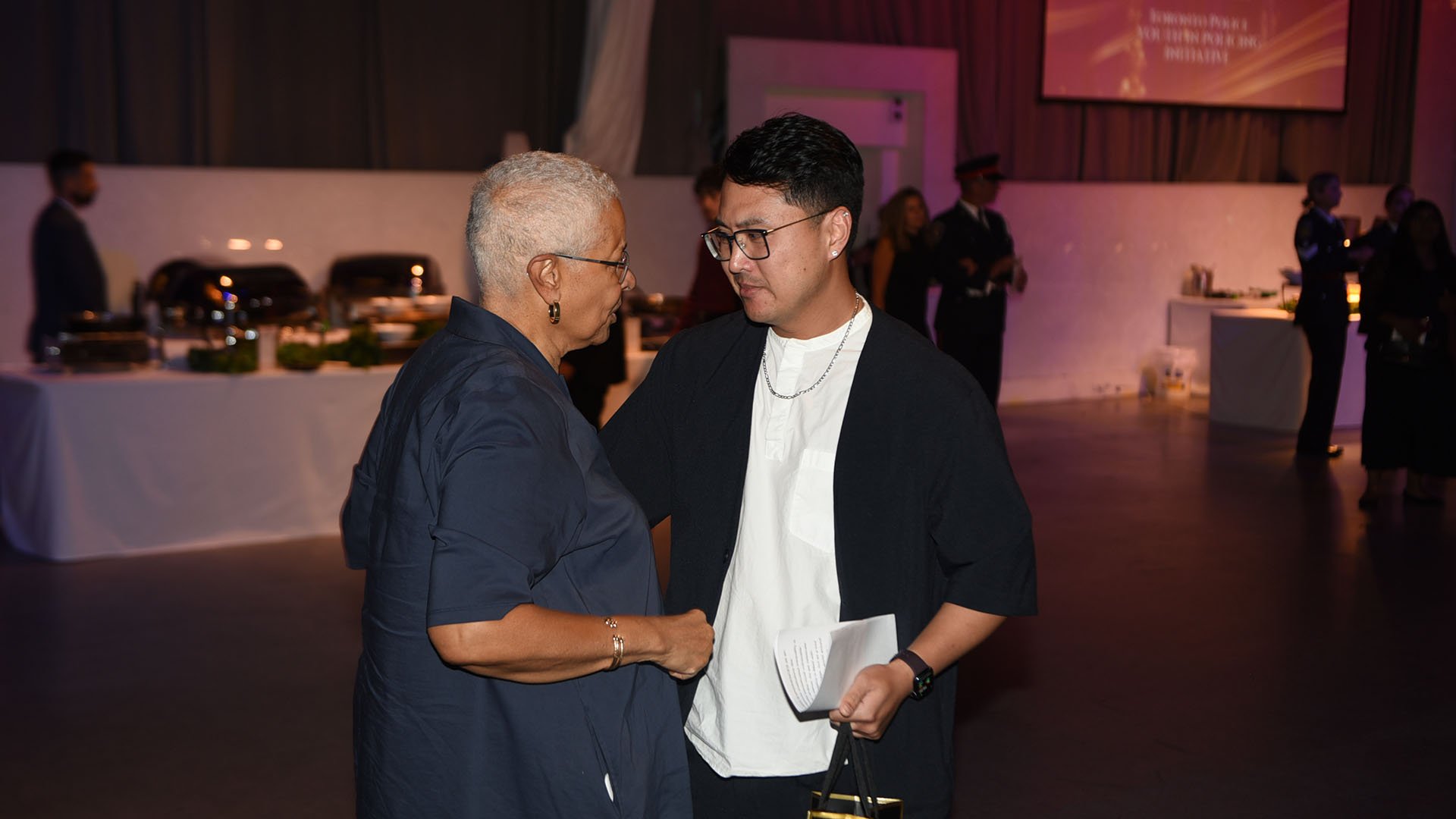 Two people speaking