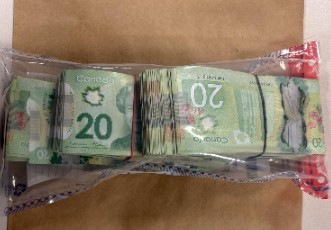 Man Arrested in Firearm Investigation,
Queen Street West and Denison Avenue,
Seized Items