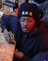 Photo of outstanding suspect #1