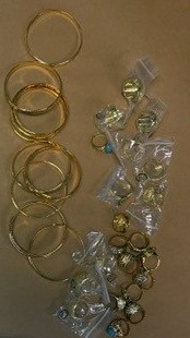 Man Arrested in Distraction Theft Investigation,
Seized Items