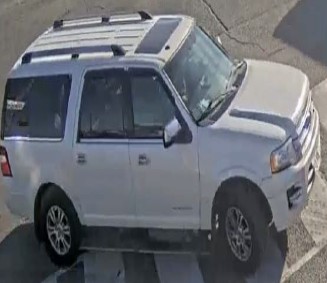 White Ford Expedition vehicle with Ontario license plate DJJS 875