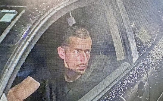 a man sitting in a car