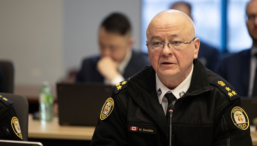 Police officer seated